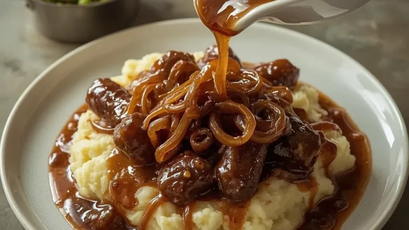 Gordon Ramsay onion gravy over beef sausages and mashed potatoes